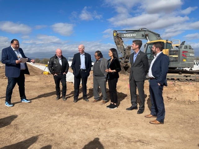 During a visit to the Gila River Indian Community in Arizona on Feb. 22, Interior Secretary Deb Haaland, fifth from left, announced $1.7 billion from the Bipartisan Infrastructure Law will be used to fulfill settlements for several tribal water rights claims.