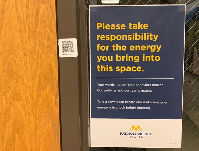 Posters like this one are present throughout Monument Hospital in Rapid City, urging visitors and employees to remain calm and respectful while in the facility. Photo: