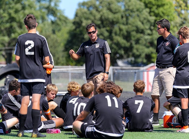 Stephen Spitzer coaches a Washington Community High School JV soccer game in this 2019 photo.
