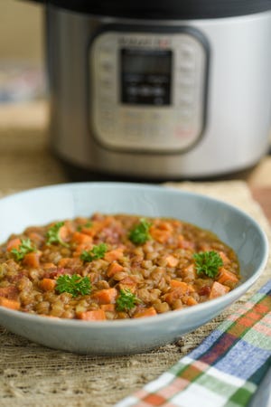 Today's lentil stew includes sweet potatoes, canned diced tomatoes, garlic, onion and celery.