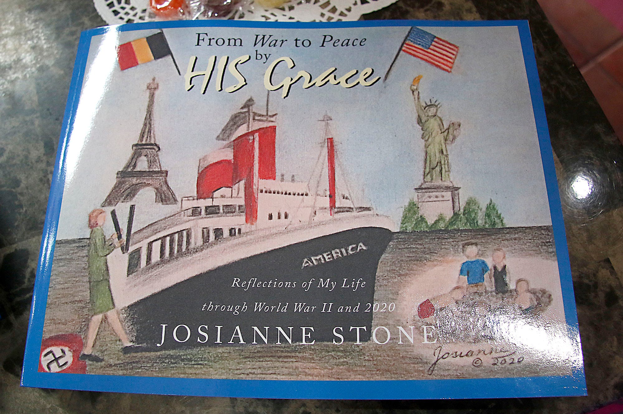 Ashland WWII survivor celebrates 95th birthday with book signing