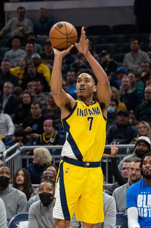 Feb 25, 2022; Indianapolis, Indiana, USA; Indiana Pacers guard Malcolm Brogdon (7) shoots the ball in the second half against the Oklahoma City Thunder at Gainbridge Fieldhouse. Mandatory Credit: Trevor Ruszkowski-USA TODAY Sports