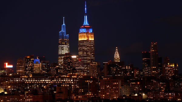 The Empire State Building is lit in the colors of 