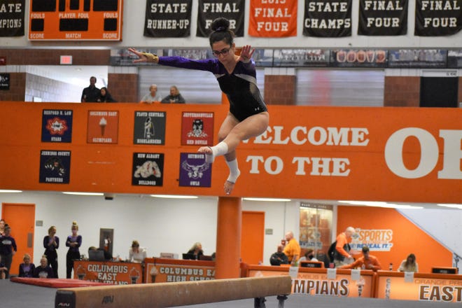 Bloomington South's Stella Eibling performs on the beam during sectionals at Columbus East High School on Feb. 26, 2022