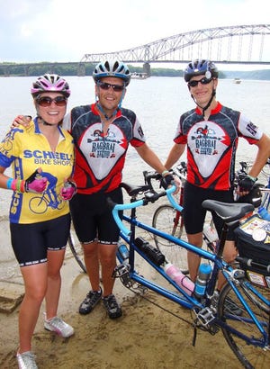 My stepmom Melissa, left, Dad, Al, center, and me in Dubuque at the end of RAGBRAI in 2010.