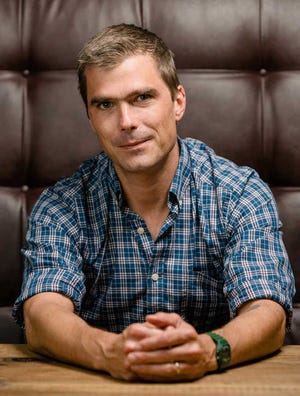 This undated file photo shows Athens restaurateur Hugh Acheson, who opened the acclaimed Five Points restaurant Five & Ten in 2000, downtown's The National with chef Peter Dale in 2007 and Empire State South in Atlanta in 2010.