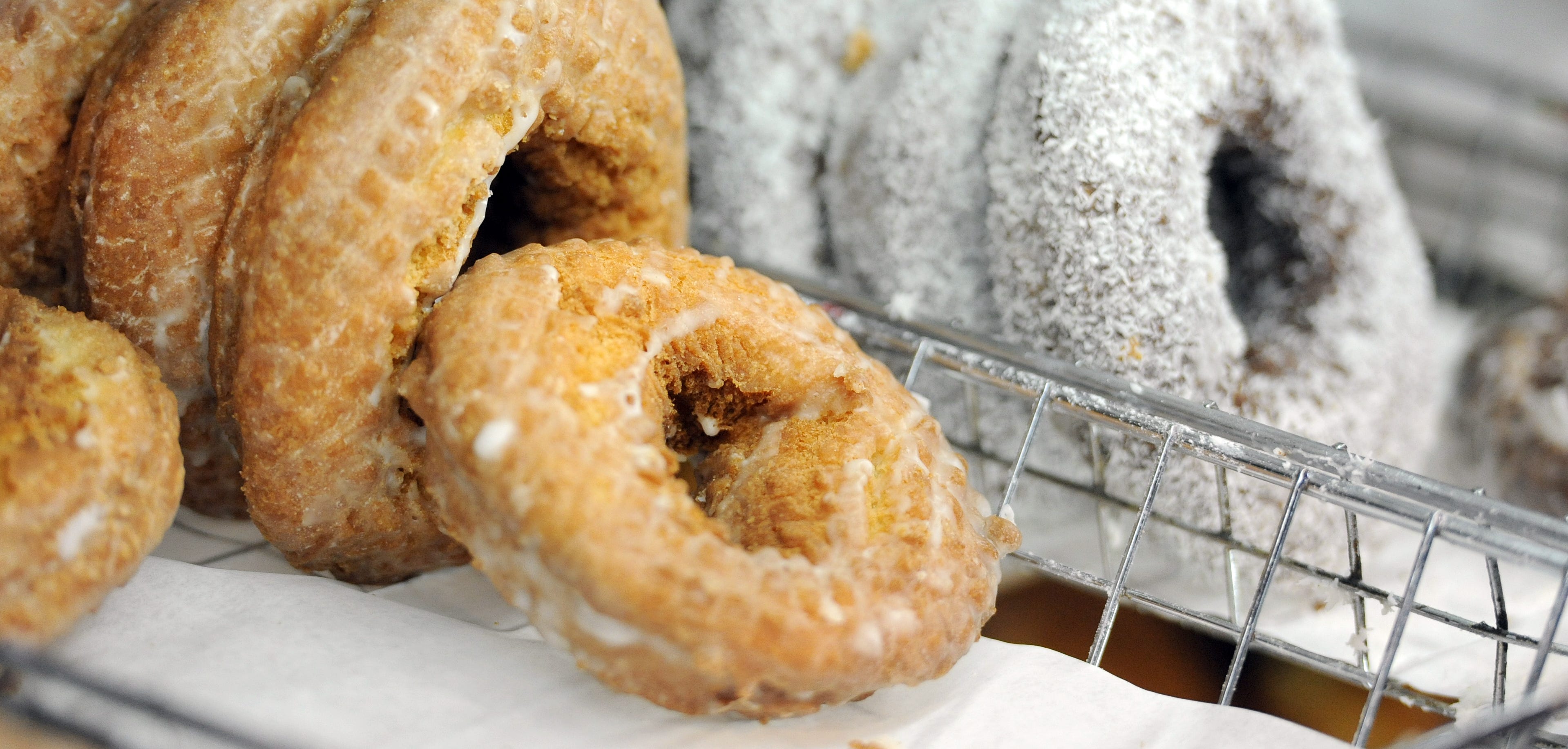 close up of a stake of plain donuts