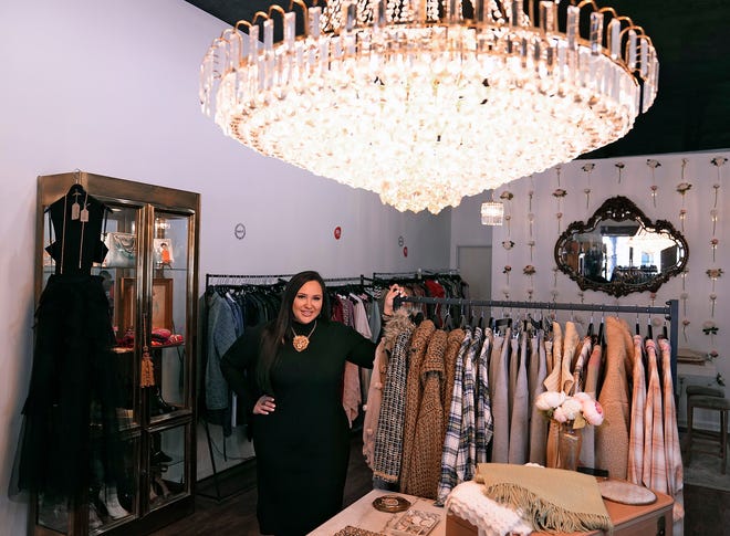 Lindsey Drahos, the owner of the retail boutique Hosful Collective, is pictured in February 2022.