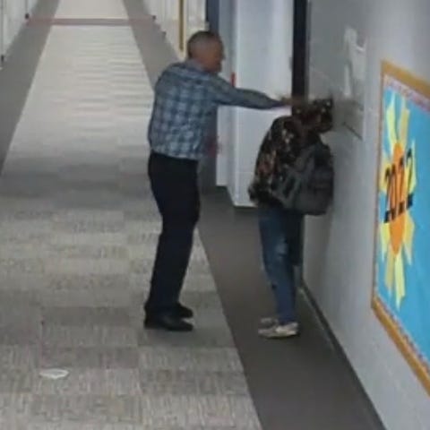 A screen grab from security camera footage shows J