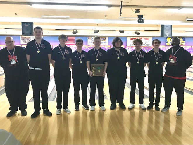 The Marion Harding boys bowling team, from left, of assistant coach Scott McCrery, Caden Millisor, Austen Valentine, Gavin Houseworth, Jayden Combs, Cameron Rayner, Jordan Hensley, Gage Warren and head coach Corey Chatman won the Division I district tournament Monday at HP Lanes in Columbus.