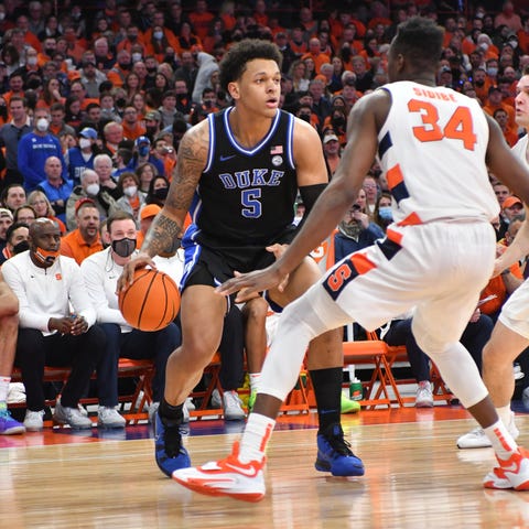 Duke forward Paolo Banchero (5) handles the ball a