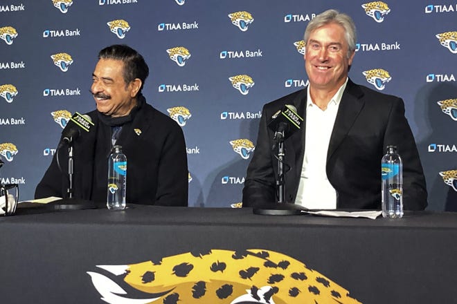 Jaguars owner Shad Khan (L), seen here during the introductory news conference for head coach Doug Pederson, has scrapped plans to hire an executive vice-president after being impressed how much Pederson's arrival has improved the working environment in the team building at TIAA Bank Field.