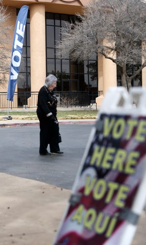 A voter is seen on primary Election Day, Tuesday, March 1, 2022, at Calvary Baptist Church. Municipal election day is this Saturday, May 7.