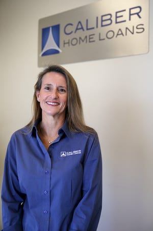 Tina-Marie Stahl stands for a portrait at Caliber Home Loans, Tuesday, March 1, 2022 in West Lafayette.