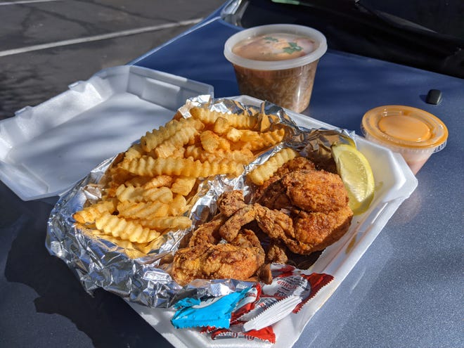 Fried frog legs, fries and a container of gumbo from Zydeco's Louisiana Kitchen in Goodyear, Arizona on Feb. 17, 2022.