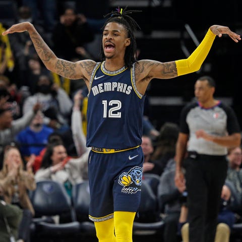 Ja Morant celebrates a first-half bucket during hi
