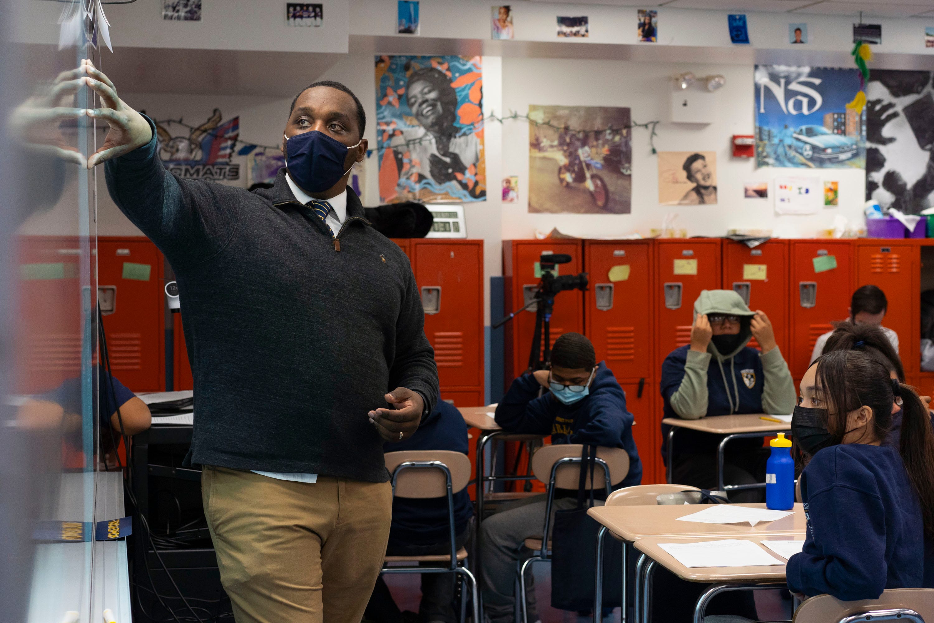 Dec 15, 2021; Manhattan, NY, United States; Joshua Joyce teaches his seventh grade students about primary and secondary sources in preparation for a class discussion. Democracy Prep charter schools are known to embrace and teach on a platform of anti-racism. Mandatory Credit: Michelle Hanks-USA TODAY