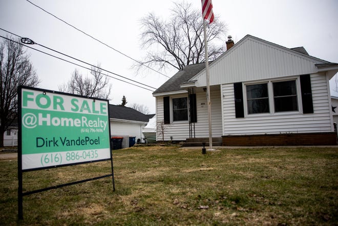 A home listed for $269,900 stands Wednesday, March 2, 2022, along Graafschap Road in Holland.