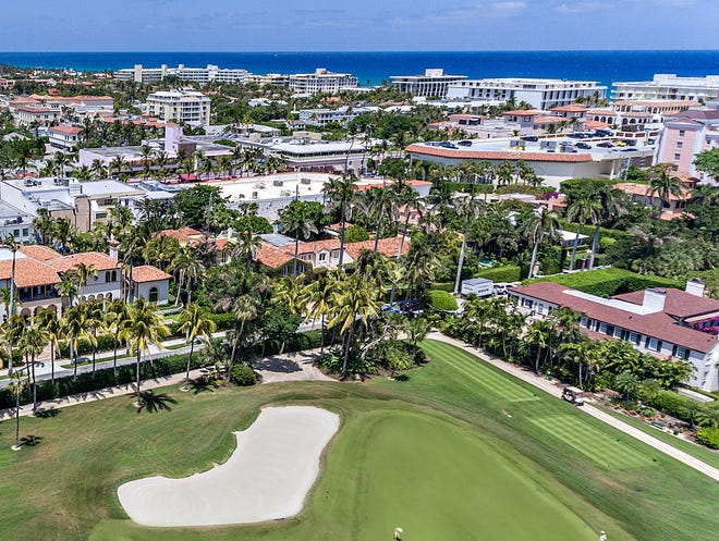 Sold in March for a recorded $44.93 million, a house at 5 Golfview Road in Palm Beach can be seen with its two chimneys in the foreground right, abutting the Everglades Club Golf Course, a block south of Worth Avenue.