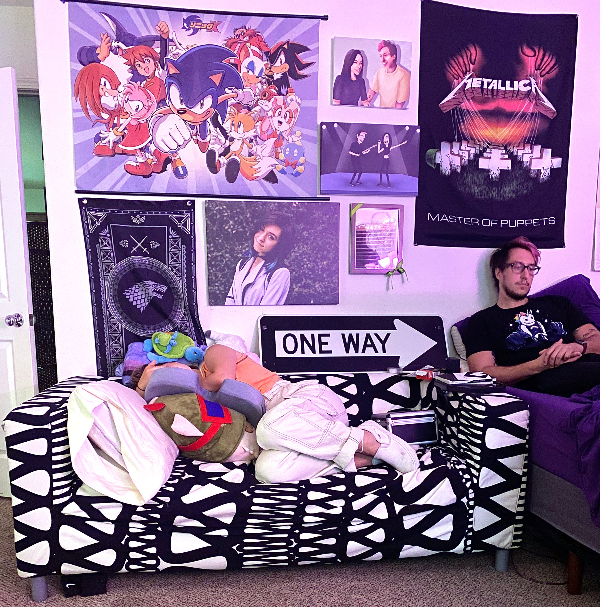 In Christina Grimmie's bedroom in California, Ryan Brown (left) and Marcus Grimmie (right) rest after a recording session.