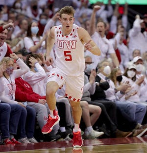 Wisconsin forward Tyler Wahl (5) reacts after making a three-point basket during the first half of their game against Purdue Tuesday, March 1, 2022 at the Kohl Center in Madison, Wis.
