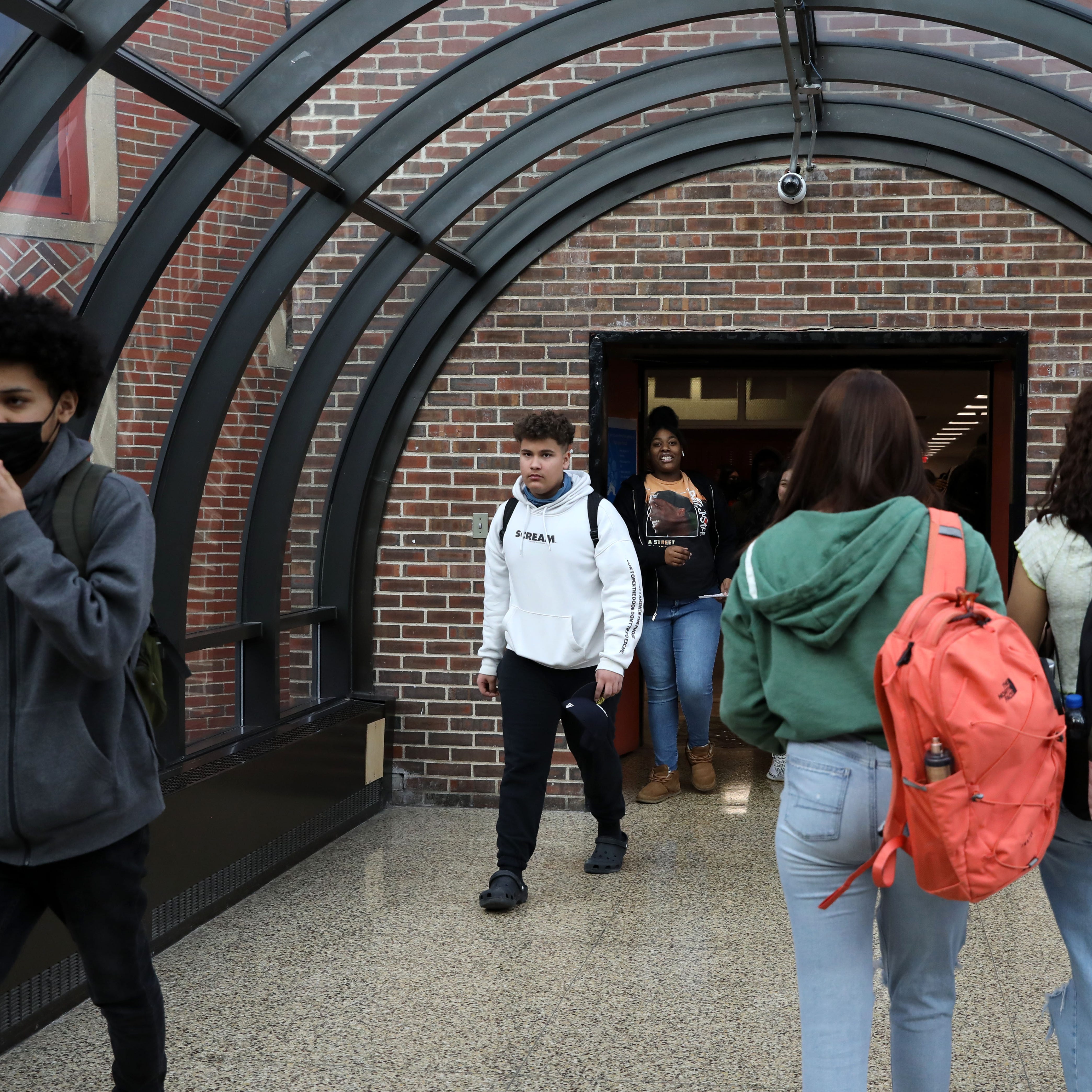 Students change classes at Roosevelt High School Early College Studies in Yonkers March 2, 2022. Today marked the lifting of the state's mask mandate for schools after two years of pandemic education. 