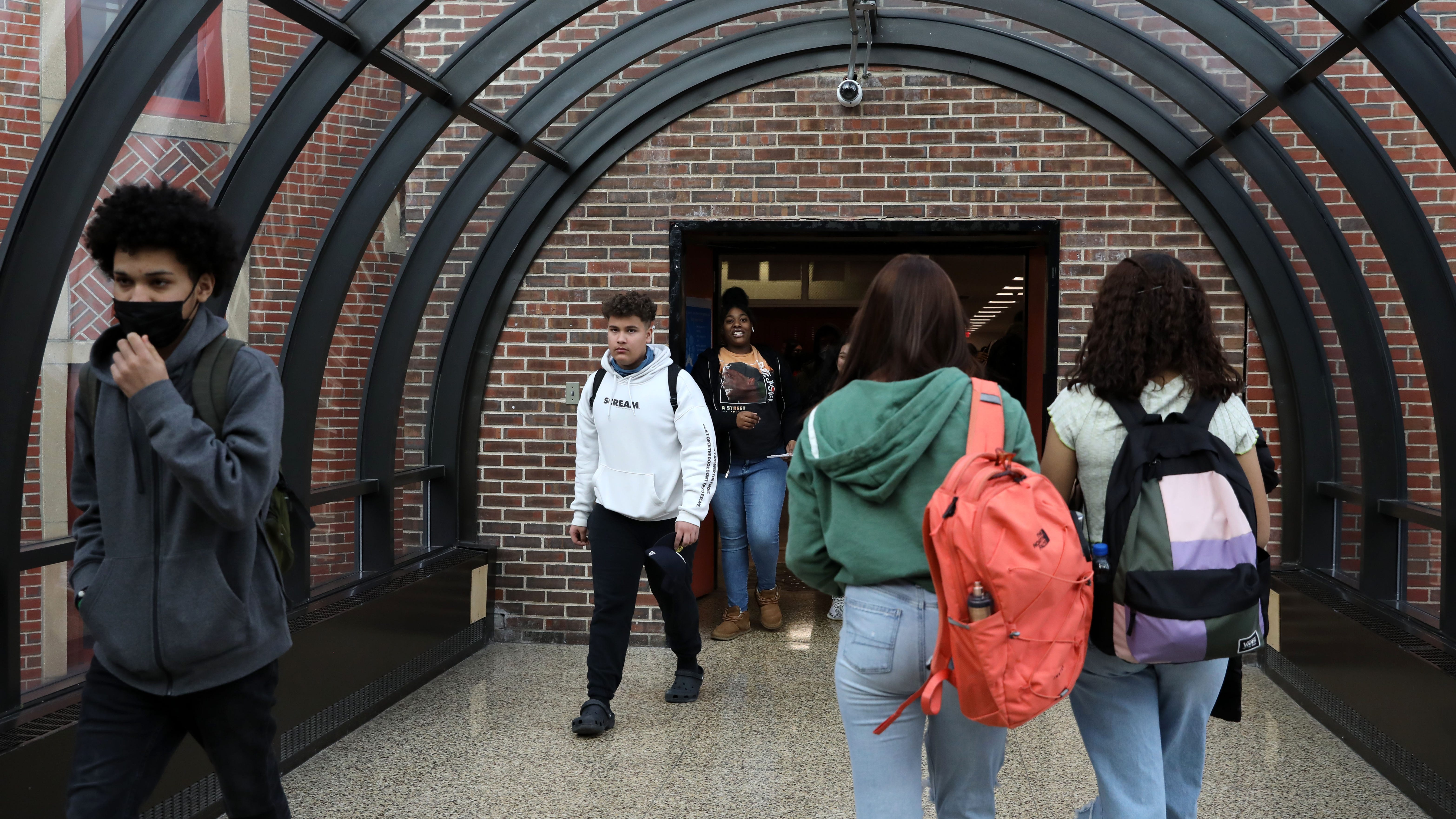 Students change classes at Roosevelt High School Early College Studies in Yonkers March 2, 2022. Today marked the lifting of the state's mask mandate for schools after two years of pandemic education. 