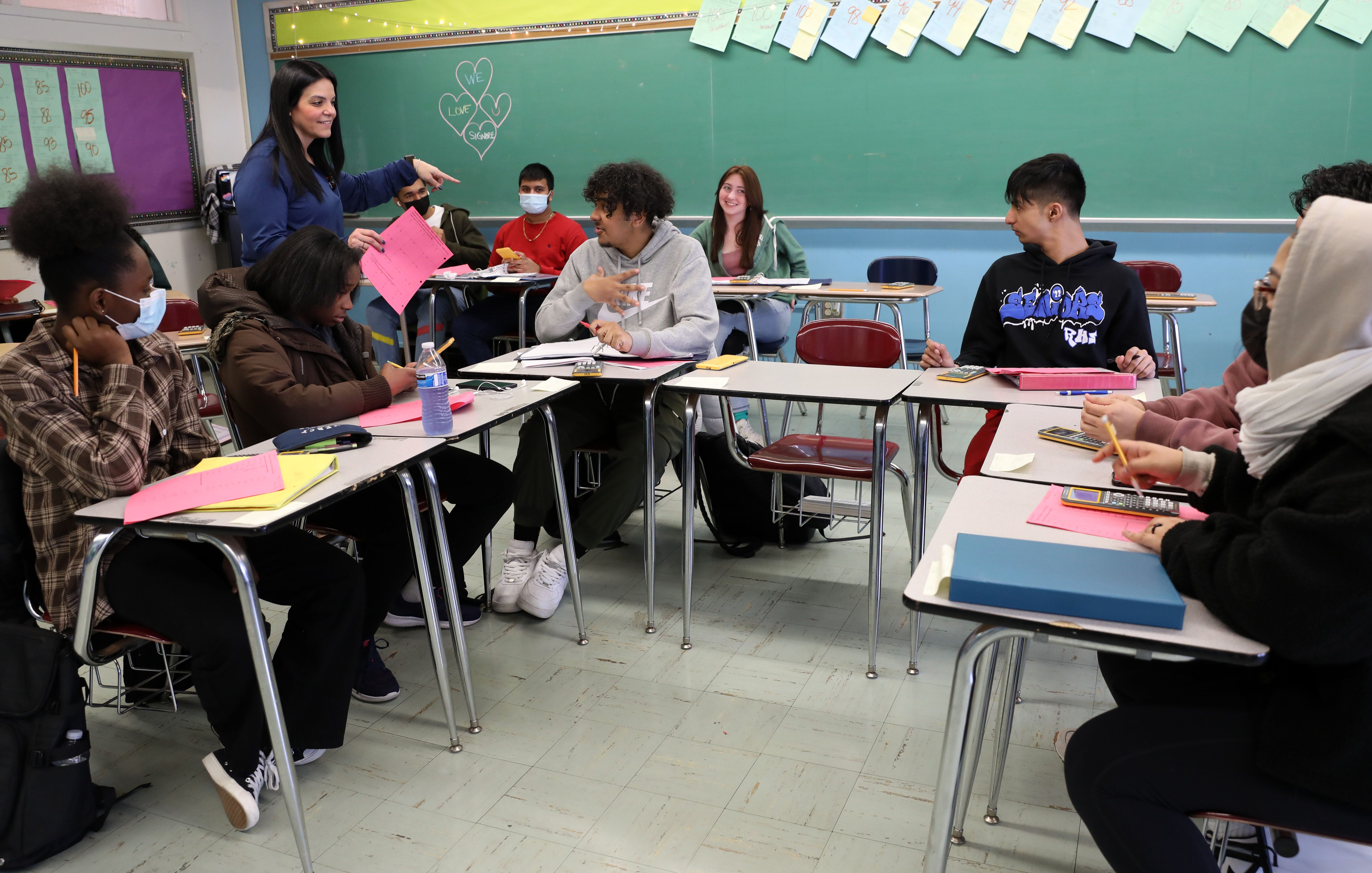 Marisa Signore leads a precalculus class at Roosevelt High School Early College Studies in Yonkers on March 2, 2022. Today marked the lifting of the state's mask mandate for schools after two years of pandemic education.