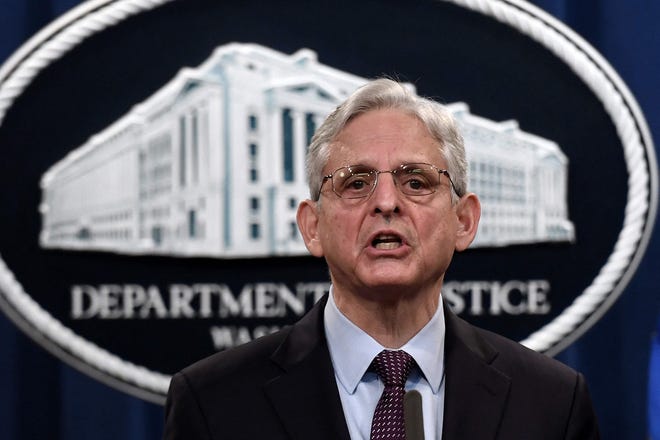 In this file photo taken Nov. 8, 2021, US Attorney General Merrick Garland speaks during a news conference over a ransomware cyberattack, at the Department of Justice, in Washington, D.C. - Garland announced Wednesday the launch of a task force to pursue "corrupt Russian oligarchs" and violators of sanctions imposed on Russia for its invasion of Ukraine.