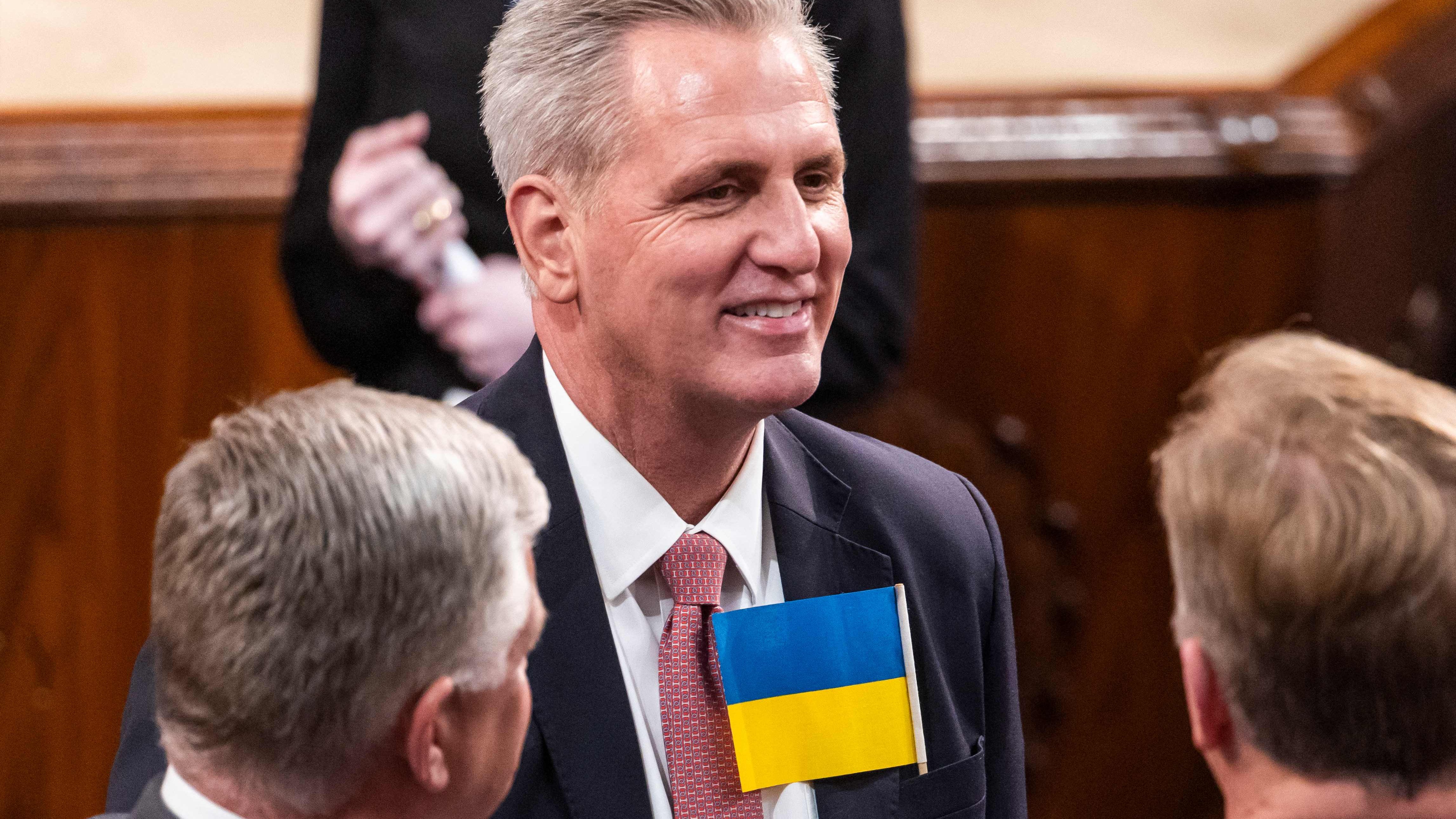 House Minority Leader Kevin McCarthy wears a Ukranian flag before US President Joe Biden delivers his first State of the Union address at the US Capitol in Washington, DC, on March 1, 2022.