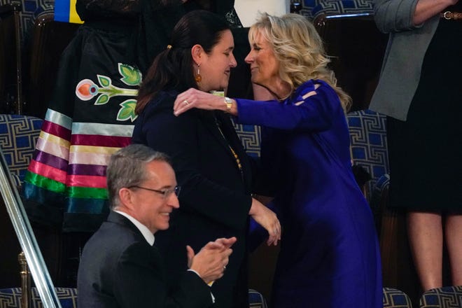 WASHINGTON, DC - MARCH 01: Ukraine Ambassador to the United States, Oksana Markarova, gets a hug from first lady Jill Biden before President Joe Biden delivers his first State of the Union address to a joint session of Congress, at the Capitol on March 01, 2022 in Washington, DC.
