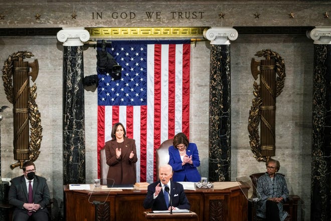 President Joe Biden delivers his first State of the Union address to a joint session of Congress at the Capitol, Tuesday, March 1, 2022, in Washington, as Vice President Kamala Harris and Speaker of the House Nancy Pelosi of Calif., applaud.