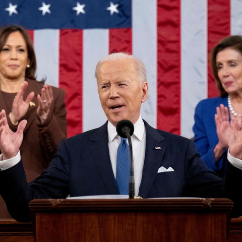 US Vice President Kamala Harris (L) and US House S