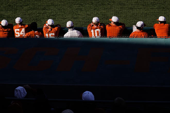 Texas players watch from the dugout during the 6-1 win over Alabama on Sunday at UFCU Disch-Falk Field. The Longhorns (9-0) had six of their first eight games at home in February. But Texas' March schedule has 13 of 19 games on the road.