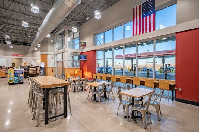 Pilot travel centers across the country will soon have seating with charging capabilities. This Pilot, which opened in February in Albuquerque, is an example of how 400 Pilot travel centers will be built or renovated in the next three years.