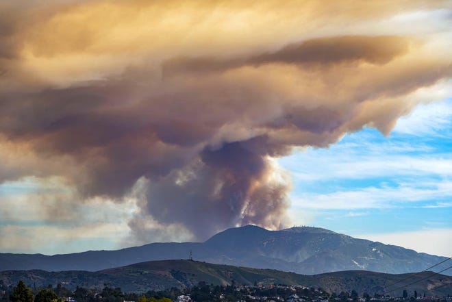 The Jim Fire burned in Southern California's Cleveland National Forest on Wednesday, March 2, 2022. Area residents said U.S. Marines were in the area using explosives at the request of U.S. Forest Service officials to destroy small stone dams.
