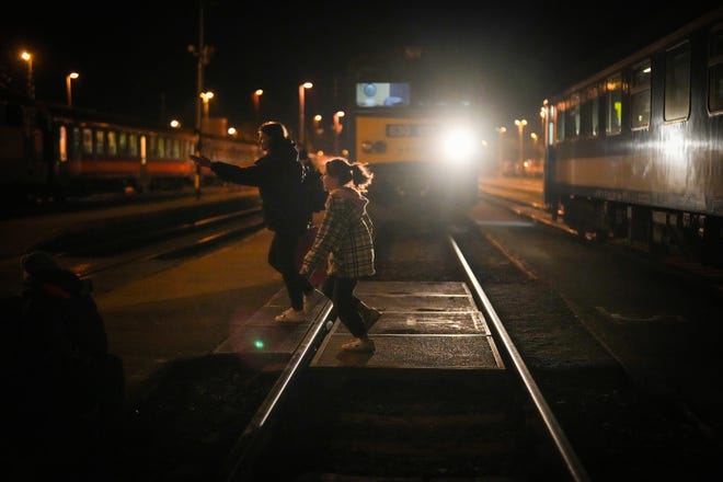 Refugees arrive at the Hungarian border town of Zahony on a train that has come from Ukraine on March 3, 2022, in Zahony, Hungary.