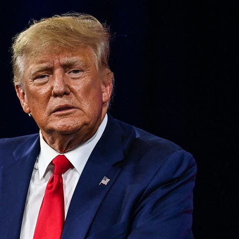 TOPSHOT - Former US President Donald Trump speaks 