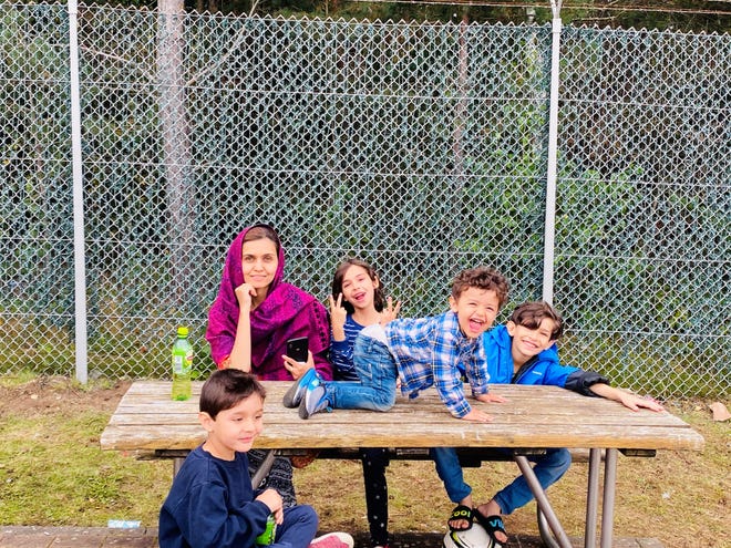 In the eight months since the fall of Afghanistan, Najib Azad and his family traveled to three countries and multiple states in the United States, not staying in one place for long. On Feb. 16, the Azad family resettled to Stevens Point from Hammond, Wisconsin. Najib Azad's wife, Sarwat Azad, left, is pictured with the couple's four children, from left, Ghani Khan Azad, 5; Shamla Azad, 7; Barlas Khan Azad, 2; and Wadan Khan Azad, 9.