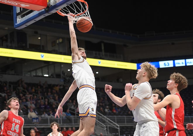 OLSH's Dawson Summers throws down a dunk while teammate Bryson Kirschner admires during the Class 2A WPIAL championship game against Fort Cherry at the Petersen Events Center in Pittsburgh.