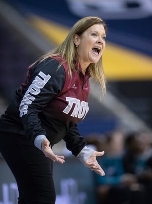 Tojans head coach Chanda Rigby questions a call during Coastal Carolina vs. Troy women’s basketball game in the Quarterfinals of the Sun Belt Conference championship tournament at the Pensacola Bay Center in Pensacola on Friday, March 4, 2022.