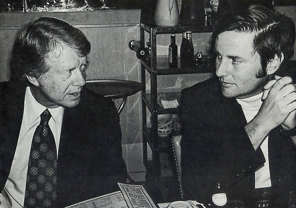 Walter R. Mears, right, talks with presidential candidate Jimmy Carter in Concord, New Hampshire, before the New Hampshire Primary in 1976.
