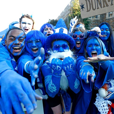 Duke Blue Devils fans tailgate prior to a game aga