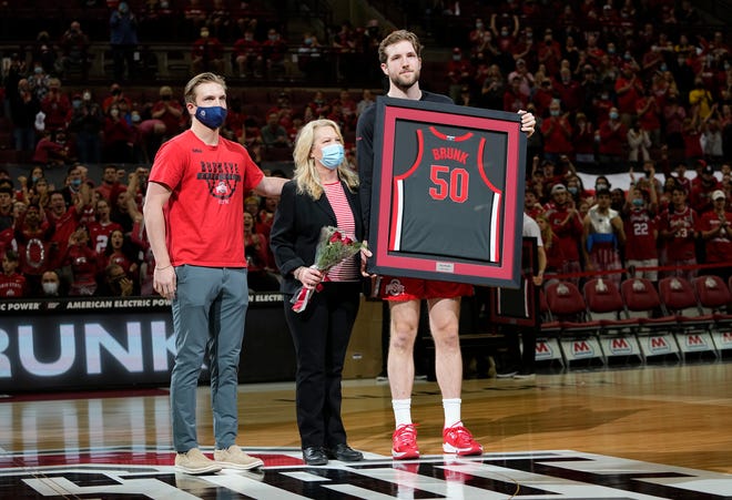 Ohio State Buckeyes center Joey Brunk (50) is recognized during senior day festivities prior to the NCAA men's basketball game against the Michigan Wolverines at Value City Arena in Columbus on March 6, 2022. Michigan won 75-69.