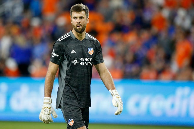 FC Cincinnati goaltender Alek Cann (1) gives up a go-ahead point in the second half of the MLS soccer match between FC Cincinnati and DC United at TQL Stadium in Cincinnati on Saturday, March 5, 2022. After that, walk back to the goal. DC United won the match 1-0 with a goal from an injury time penalty kick.