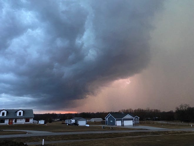 A storm cloud moves over rural Jasper County in Iowa on Saturday, March 5, 2022.