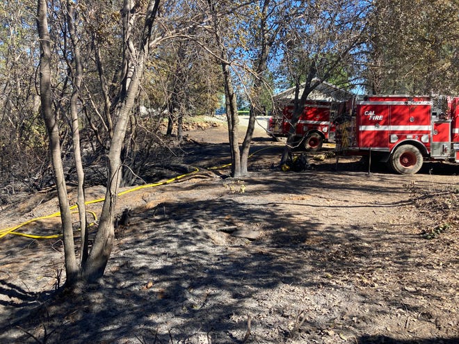 Crews continued mopping up the Flanagan Fire north of Redding on Sunday. The California Department of Forestry and Fire Protection said the blaze started when one of its crews was burning a pile of debris and it escaped and started the 88-acre fire.