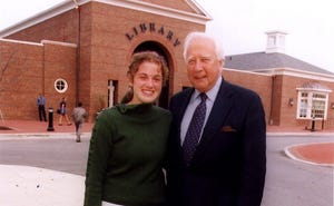 Pulitzer Prize-winning author and historian David McCullough poses for a photo with New Albany High School student Rachel Welty during the 2003 dedication of the New Albany branch of the Columbus Metropolitan Library.