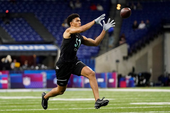 Notre Dame defensive back Kyle Hamilton (51) participates in a drill at the NFL football scouting combine in Indianapolis, Sunday, March 6, 2022. (AP Photo/Steve Luciano)
