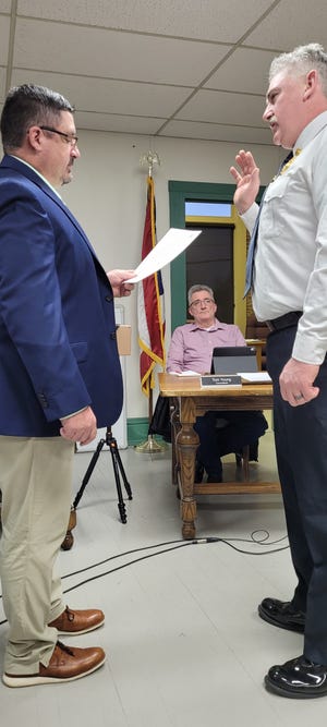 Mayor Jason VanSickle administers the oath of office to new Loudonville Fire Chief Joe Kiefer during the Monday, March 7 meeting of Loudonville Village Council.